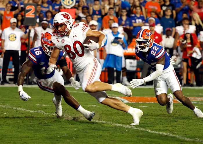 Utah Utes tight end Brant Kuithe (80) runs with the ball against the Florida Gators during the second quarter at Steve Spurrier-Florida Field.